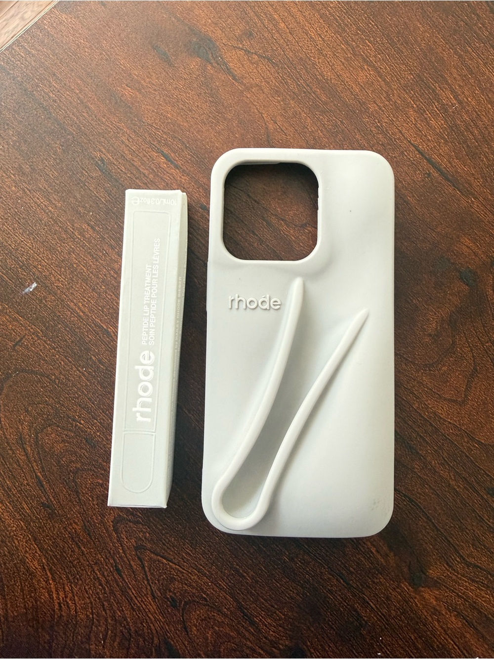 RHODE Cream Soft Silicone iPhone Case with Integrated Strap